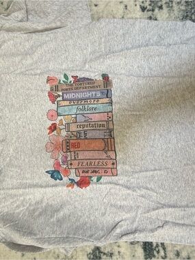 Graphic Taylor Swift Eras Book Tee - Light Gray with Pastel Floral Print